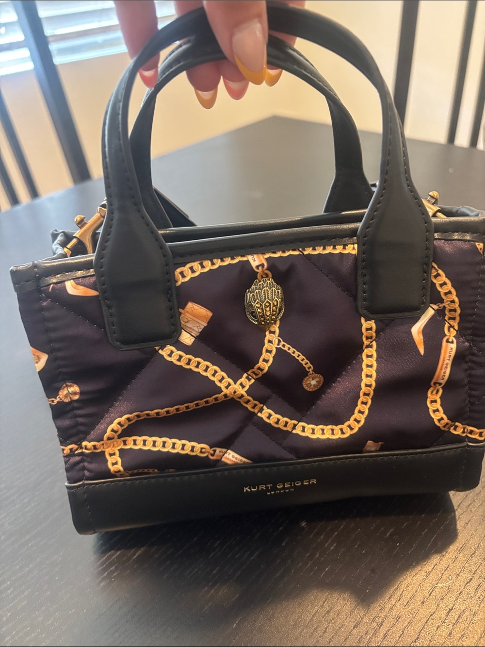 Kurt Geiger London mini Quilted Black Crossbody Bag with Gold Chain Print